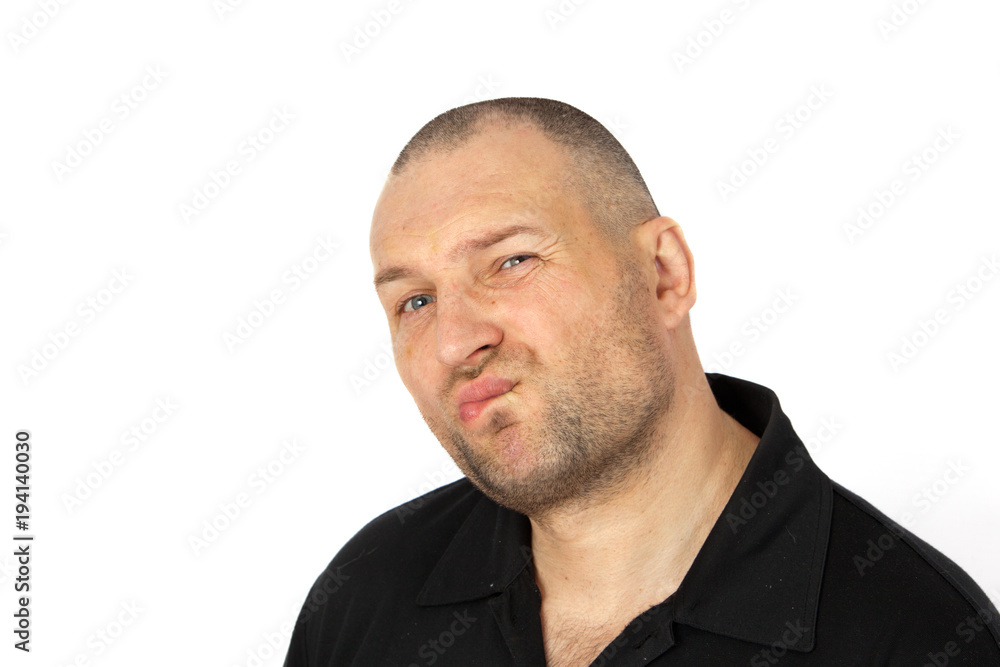 Fototapeta premium Portrait of a young gloomy young men, suspicious emotion concept