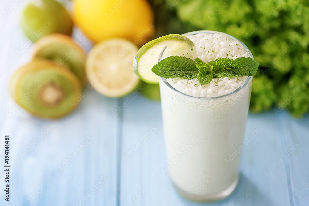 healthy food concept. milkshake in glass and fresh green vegetables. healthy food concept. milkshake in glass and fresh green vegetables.