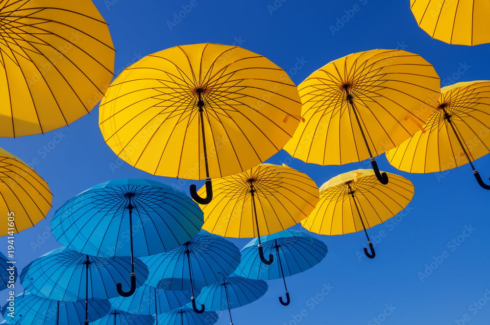 Obraz premium colorful umbrellas under the blue sky