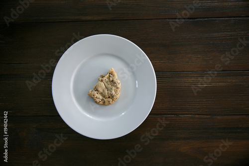 Broken and Eaten Cookie on Plate