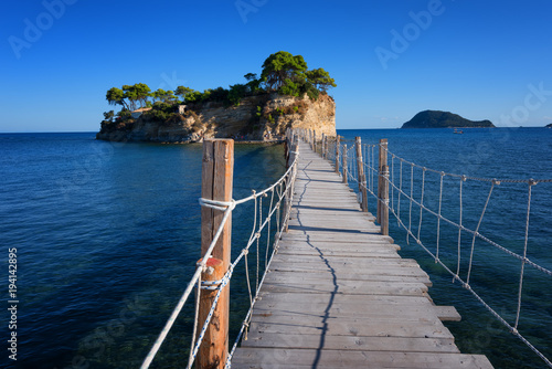 View from Agios Sostis and Cameo island. A beautiful small island with wooden bridge and turquoise water. Zakynthos Greece.