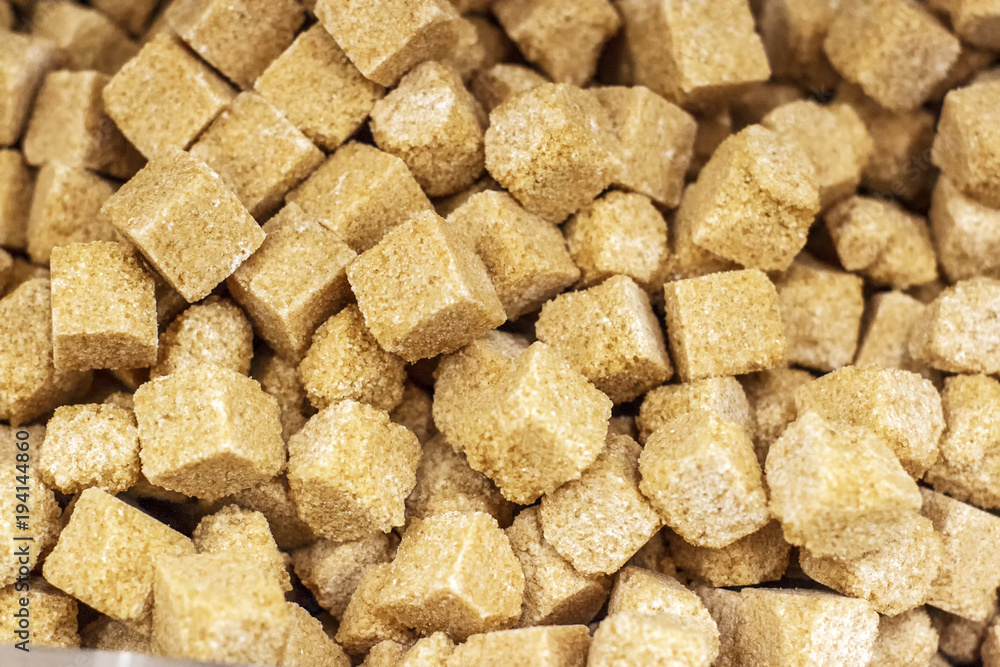 Cubes of useful brown reed sugar background