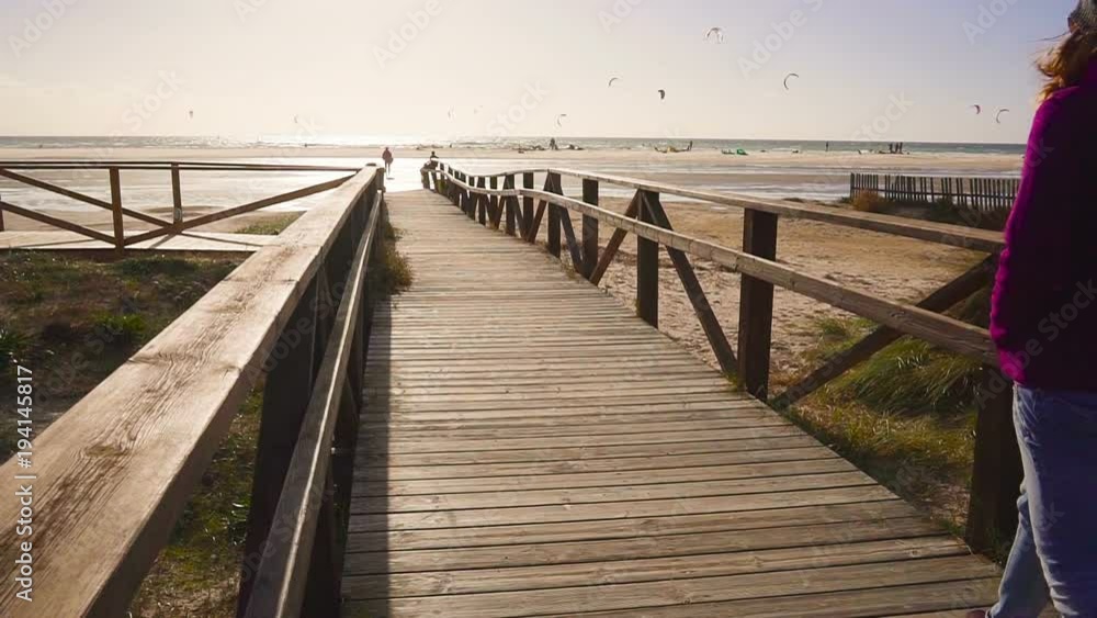 young woman going to the sea. evening. slow motion young woman going to the sea. evening. slow motion