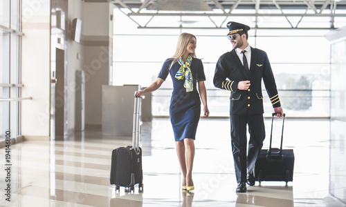 Pilot and flight attendant in airport