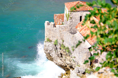 Old town in Budva in a beautiful summer day, Montenegro. Aerial image. Top view. photo