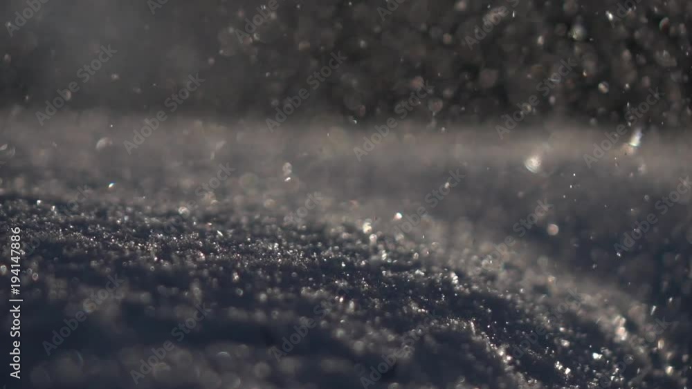 Snowdrift under snowfall close up with shallow focus. Winter sunny lyric scene in back light close up in slow motion. Sparkling snowy macro background.
Snowdrift under snowfall close up with shallow focus. Winter sunny lyric scene in back light close up in slow motion. Sparkling snowy macro background.