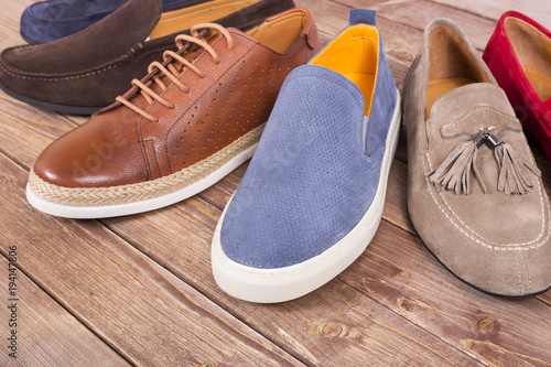 men's shoes on wooden floor