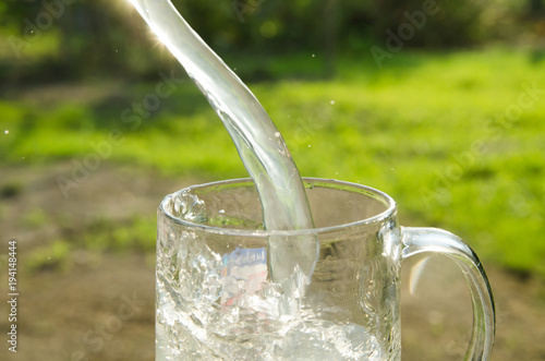 Add water to the glass