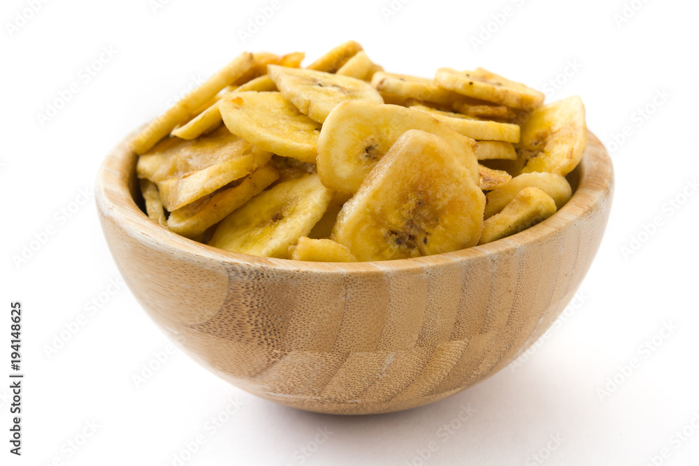 Banana chips in wooden bowl isolated on white background
Banana chips in wooden bowl isolated on white background