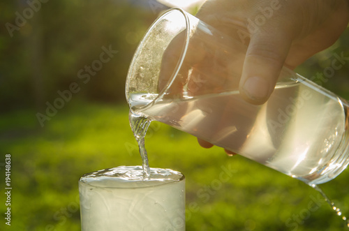 A glass filled the water photo