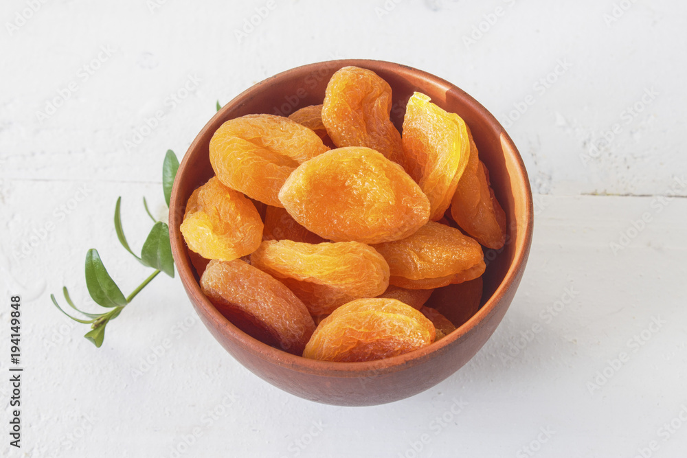 sweet big fleshy fruit dried apricots in a bowl sweet big fleshy fruit dried apricots in a bowl
