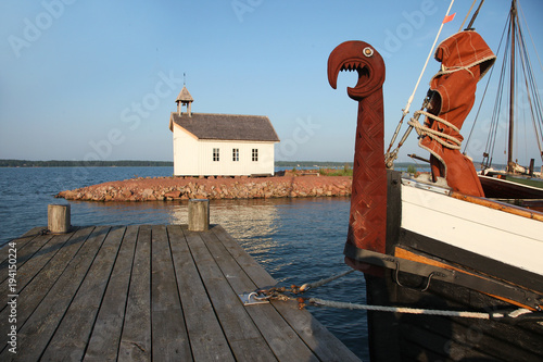 Viking boat and chapel in shipyard in Marienhamn