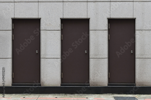 sidewalk by street wall & door