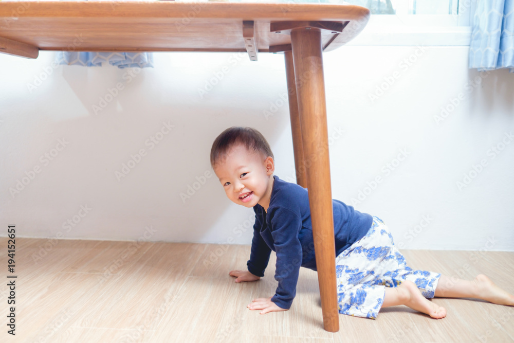 Humorous a billion carbon Cute smiling funny little Asian 18 months / 1 year old toddler boy child  playing under table