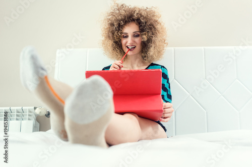 Self employed woman working from home being successful and relaxed