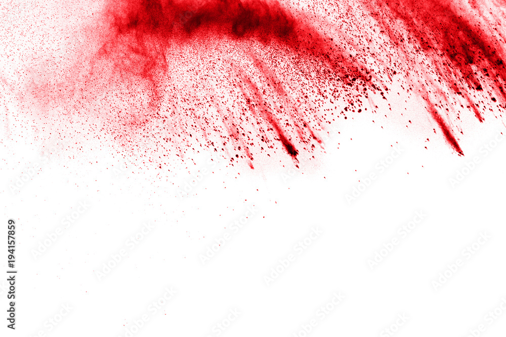 Explosion of red color powder on white background. Splash of red dust on white background.