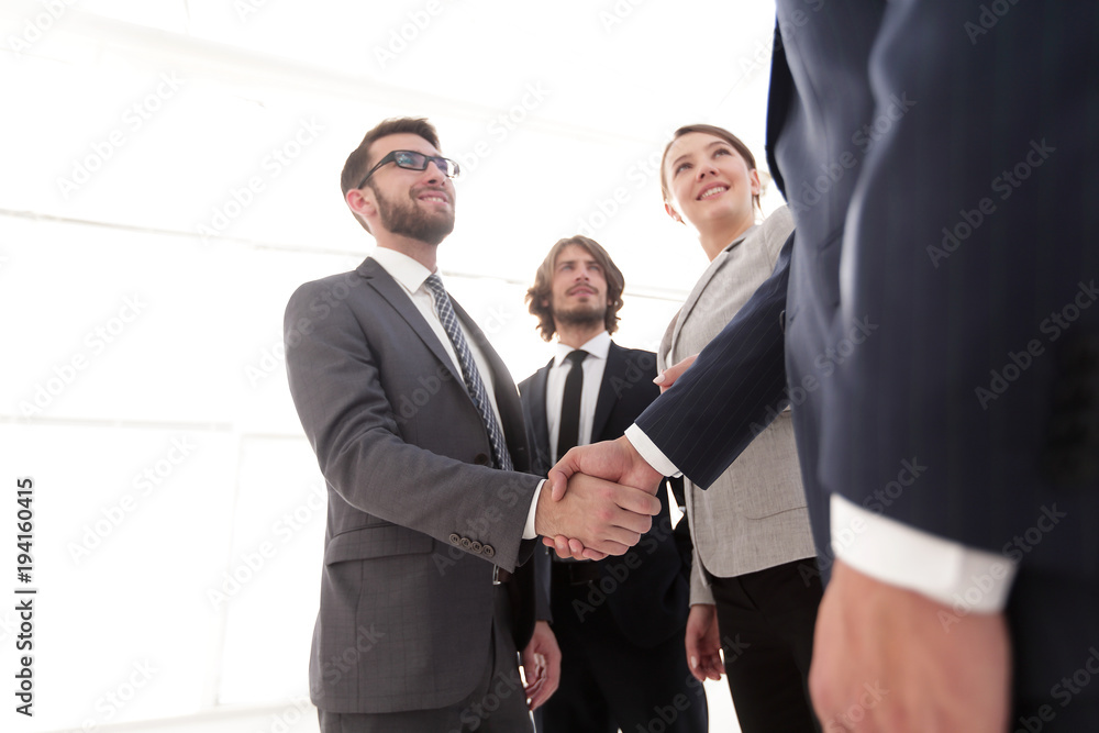 business people handshaking after good deal. business people handshaking after good deal.