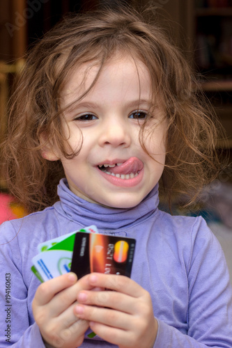 Young adorable kid girl wit...