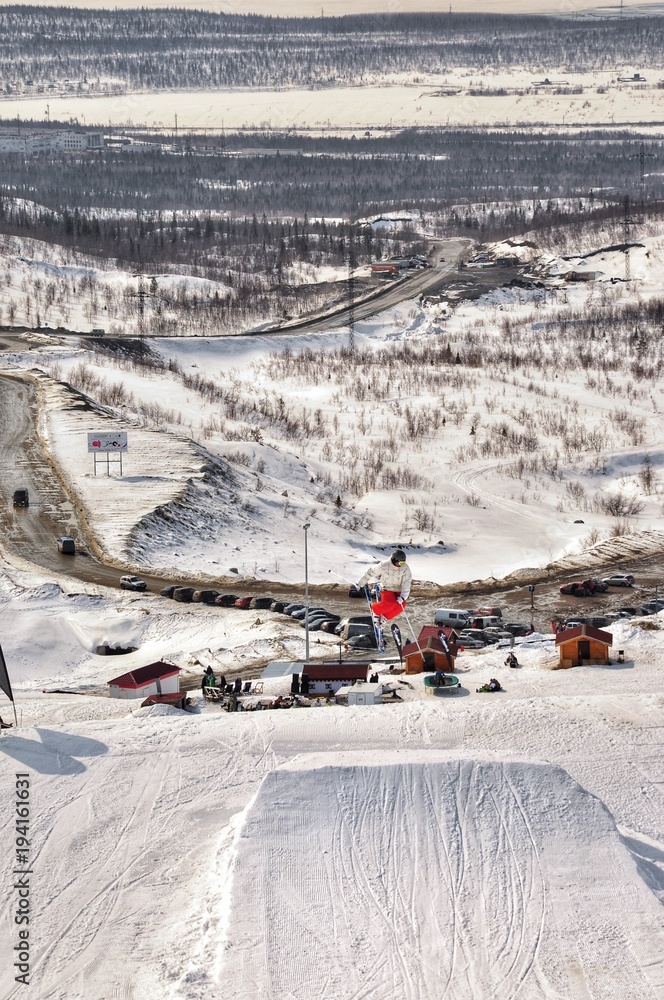 Obraz premium Winter extreme sports.Jump from the springboard.