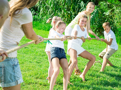 company kids with parents playing active games