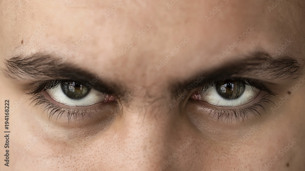 Foto de Face and eyes of a young handsome man with expressive eyes closeup  do Stock | Adobe Stock