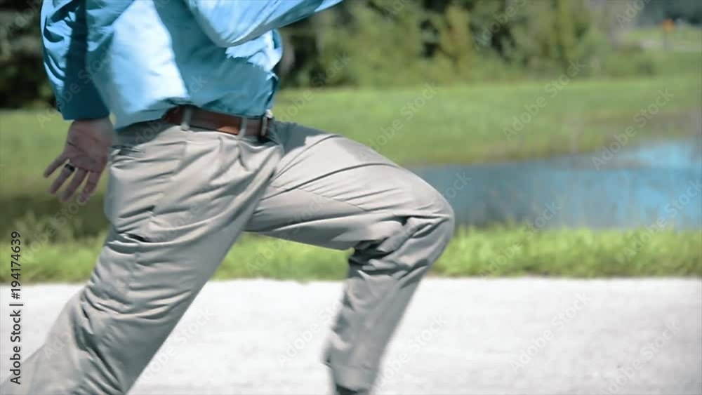 Business Man Running Down the Street