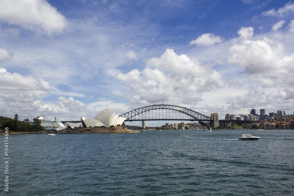 Amazing Sydney city skyline. Sydney Opera House, Sydney harbour bridge and yatch on beautiful Parramatta River
