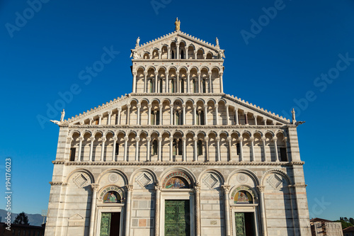Facade of the cathedral (Duomo) in Pisa on blue background, Tuscany, Italy
