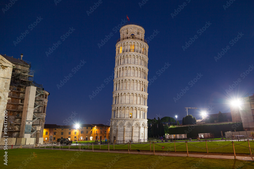 Night view of Leaning Tower of Pisa (Torre di Pisa) on Piazza dei Miracoli in Pisa, Tuscany, Italy.