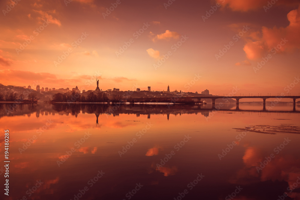 Winter evening, beautiful city panorama, view of the Kiev-Pechersk Lavra, Dnipro river, Kyiv, Ukraine