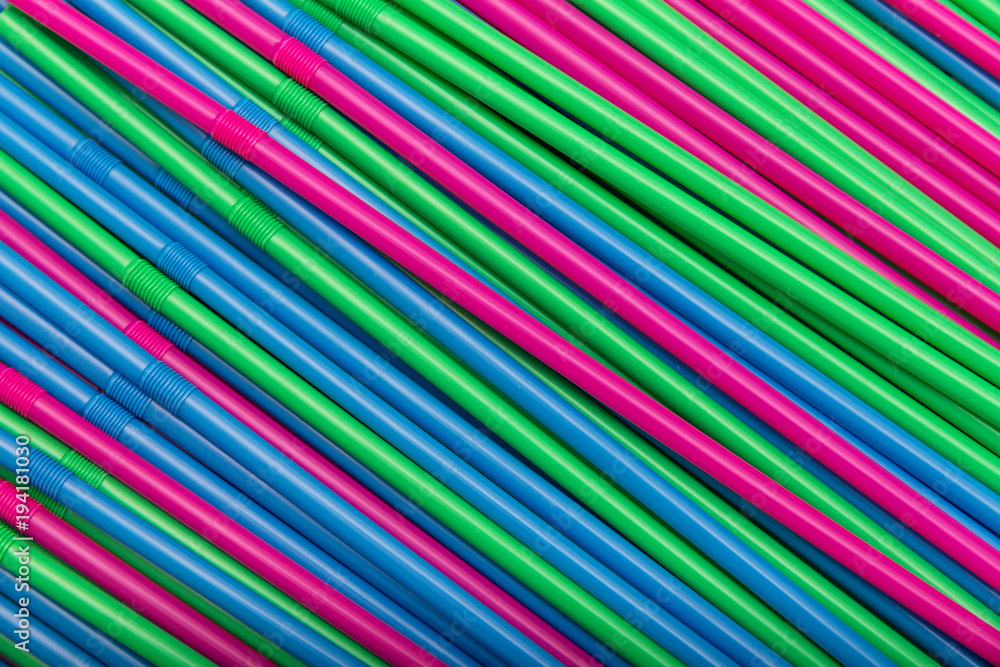 cocktail straws abstract background of different colors