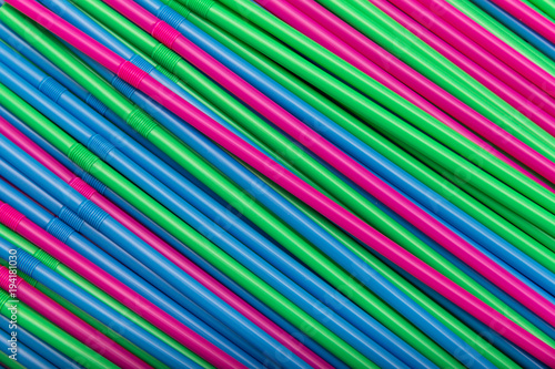 cocktail straws abstract background of different colors