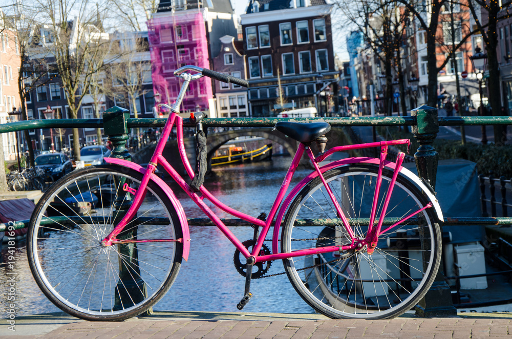 Pink bicycle in amsterdam