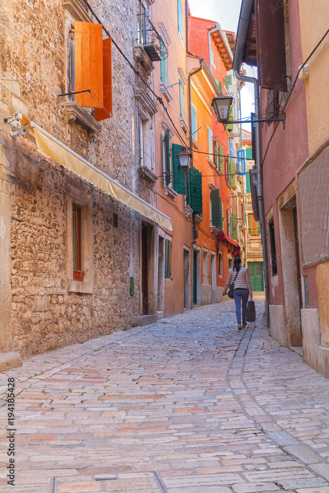 Calm, peaceful little tight narrow streets and colorful houses of Rovinj town