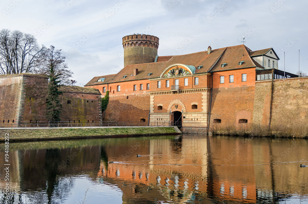 Spandau Citadel with its Julius tower, gate house and a draw bridge in Berlin, Germany