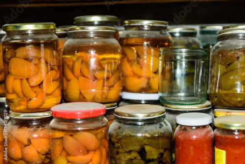 Preservation of berries and vegetables. Canned apricot, green pepper, tomatos In the basement, conservation for the winter. Bulgaria