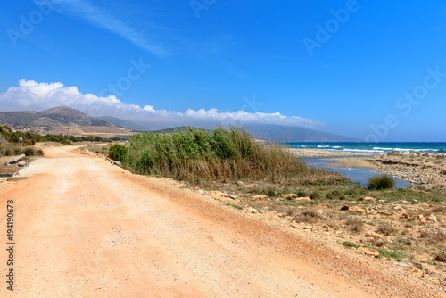 Path along beach on western side of Naxos island. Cyclades  Greece