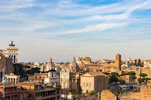 cityscape of rome italy with domes basilica monuments ruins and modern buildings