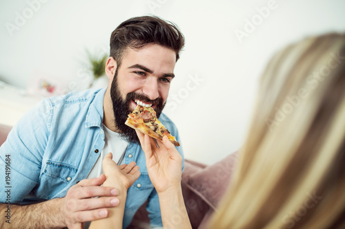 Eating pizza