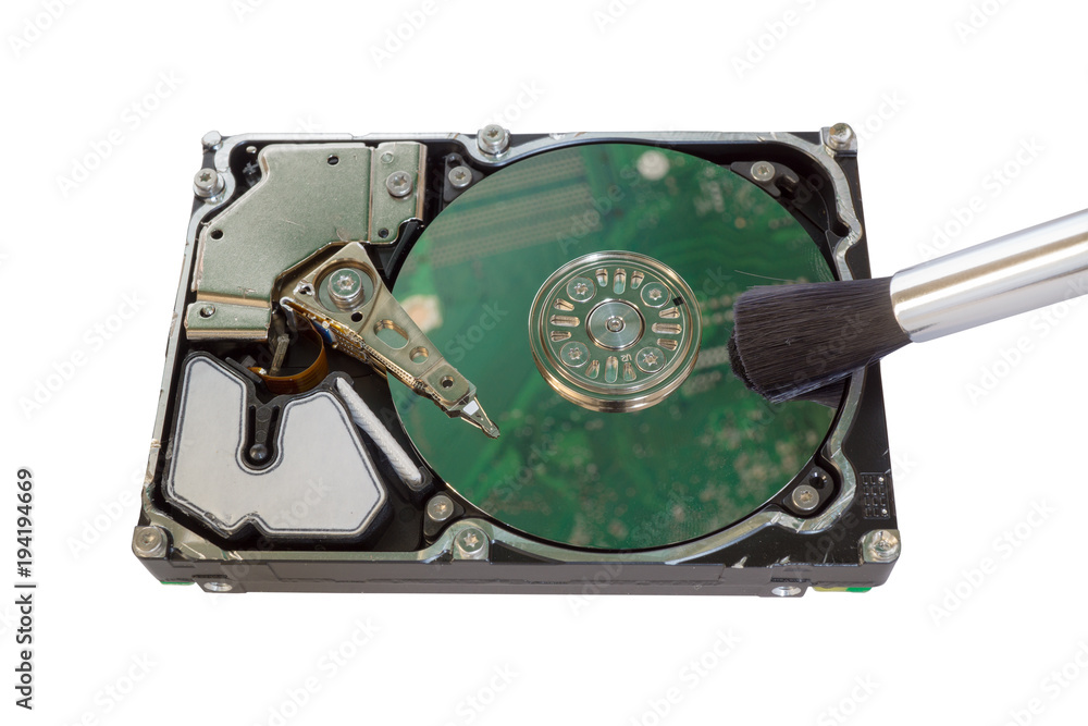 Data cleaning, Hdd with brush, close up. Data cleaning, Hdd with brush, close up.