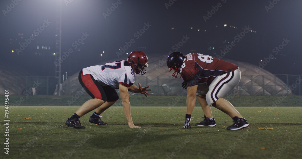 American football players in action American football players in action