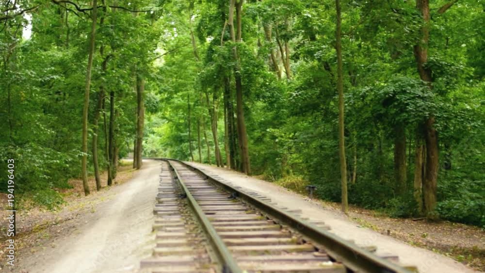Full HD video background. Children's railway in the city's central park. Rails horizontal panorama. Full HD video background. Children's railway in the city's central park. Rails horizontal panorama.