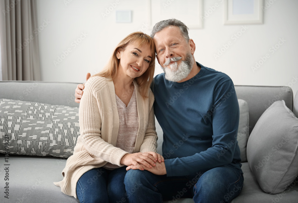 Happy senior couple at home