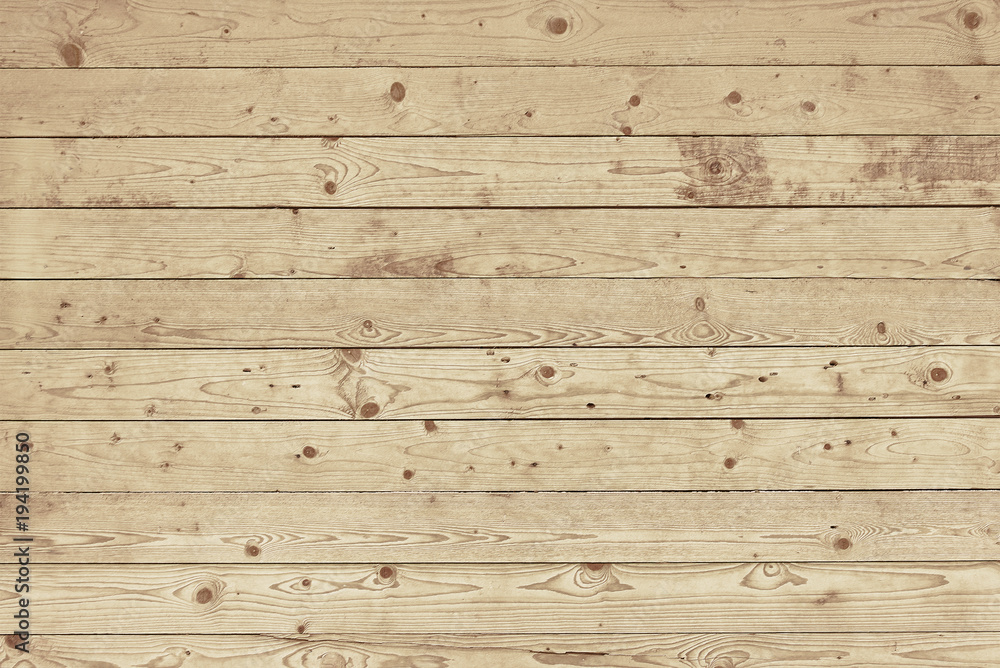 Obraz premium Old light brown wooden fence background texture