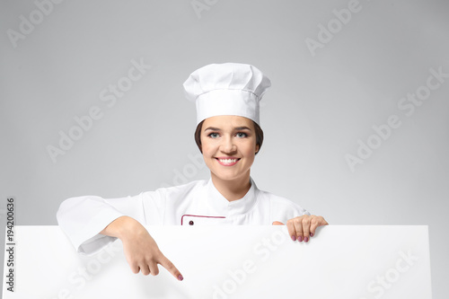 Portrait of female chef wit...