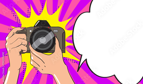 Human hands with photo camera in comic book style. Vector illustration.