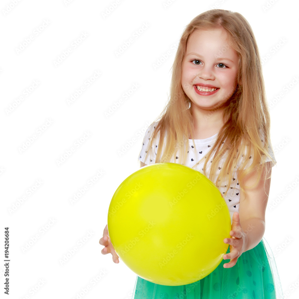 Little girl is playing with a ball Little girl is playing with a ball