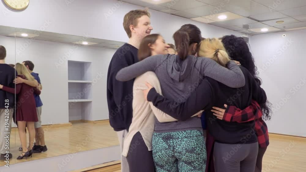 Young group people are hugging Young group people are hugging