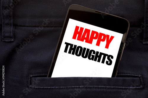 Word, writing Happy Thoughts. Business concept for Happiness Thinking Good Written phone mobile phone, cellphone placed in the man front jeans pocket. photo