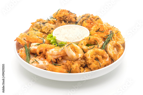 fried seafood (squids, shrimps, mussels) with sauce